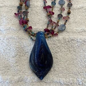 Glass and beaded necklace. Multi colored.